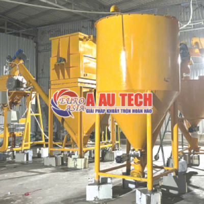 Lắp đặt dây chuyền sản xuất bột trét tại xưởng khách